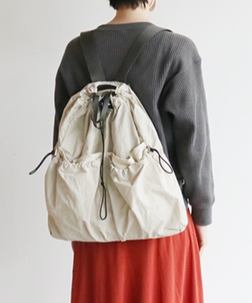 EARTH MADE(アースメイド)の「DRAWSTRING BACKPACK(バックパック/リュック・レディース・ブラック/アイボリー/ブルー/マスタード・フリー)」の12枚目の写真