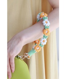 CAWAII（カワイイ）の「（クリアホルダー付き）編み込みお花のショートストラップ（その他小物）」