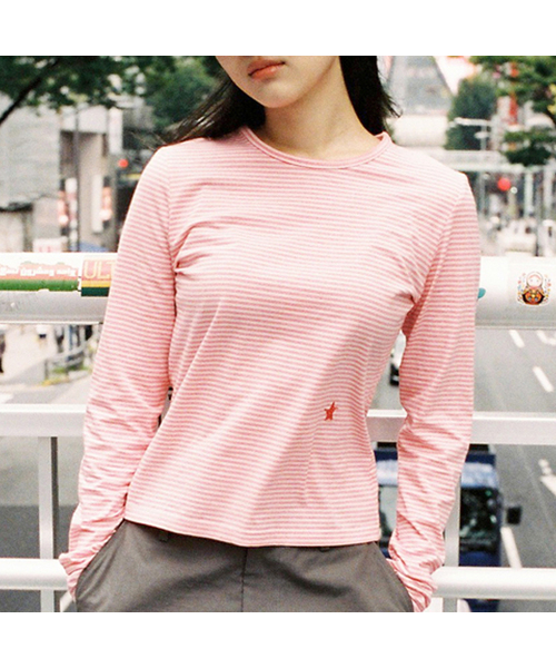 WEBHOUSE(ウェブハウス)の「ツイスタースターエンジェルロングスリーブ - ストライプピンク(Tシャツ/カットソー・レディース・その他・FREE)」の1枚目の写真