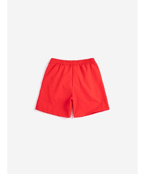 BOBO CHOSES(ボボショーズ)の「Bobo Choses swim boardshorts(水着・キッズ・レッド・10YEAR/8YEAR/6-7YEAR/4-5YEAR/2-3YEAR)」の2枚目の写真