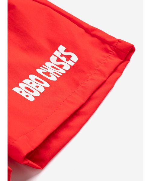 BOBO CHOSES(ボボショーズ)の「Bobo Choses swim boardshorts(水着・キッズ・レッド・10YEAR/8YEAR/6-7YEAR/4-5YEAR/2-3YEAR)」の3枚目の写真