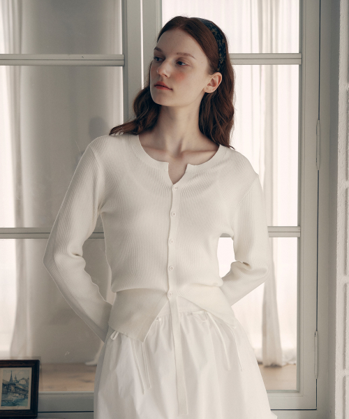 ROLAROLA(ロラロラ)の「CUT OUT RIBBED CARDIGAN IVORY(カーディガン/ボレロ・レディース・アイボリー・FREE)」の2枚目の写真