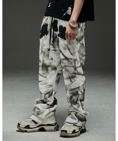 MWOONG(ムン)の「M.C.R. code stud dirty P IV F(スウェットパンツ・レディース・その他・FREE)」の1枚目の写真