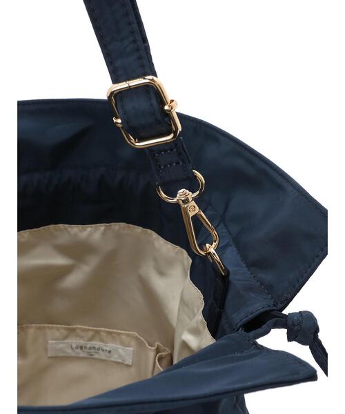Lugnoncure(ルノンキュール)の「巾着ショルダーバッグ(ハンドバッグ・レディース・ネイビー/オフホワイト・F)」の11枚目の写真