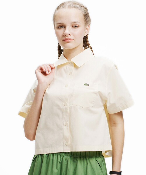LACOSTE(ラコステ)の「ドライタッチ クロップ ハーフスリーブシャツ(シャツ/ブラウス・レディース・ピンク/オフホワイト・40/36/38/34)」の1枚目の写真