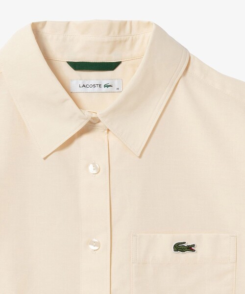 LACOSTE(ラコステ)の「ドライタッチ クロップ ハーフスリーブシャツ(シャツ/ブラウス・レディース・ピンク/オフホワイト・40/36/38/34)」の8枚目の写真