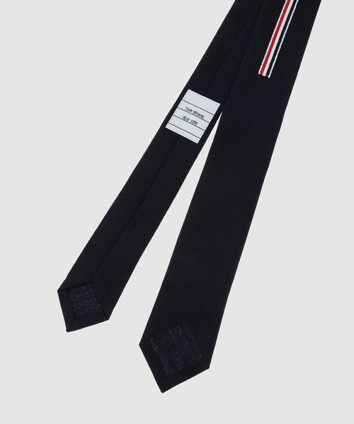 THOM BROWNE(トムブラウン)の「CLASSIC TIE W/ GG APPLICATION IN 2 PLY CRISPY WOOL SUITING(ネクタイ・メンズ・グレー/ネイビー・ONE SIZE)」の3枚目の写真