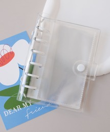 ammy.（エイミードット）の「【 ammy. / エイミードット 】 クリア 6穴 バインダー / シール帳 ( A7サイズ / リフィル10枚付き / チャーム取り付け可能 )（ステッカー/テープ）」