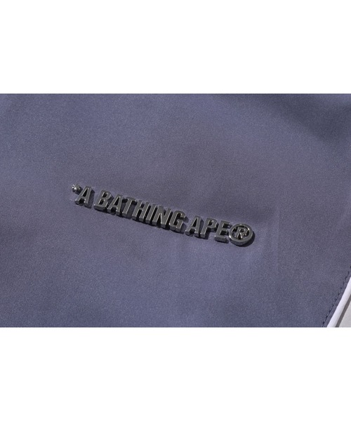 A BATHING APE（アベイシングエイプ）の「BATHING APE LOGO NYLON TRACK JACKET（ミリタリージャケット・メンズ・ブラック・MEDIUM/XX-LARGE/SMALL/X-LARGE）」の5枚目の写真