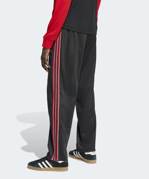 adidas(アディダス)の「ファイヤーバード ルーズ ピンストライプ トラックパンツ / アディダスオリジナルス adidas Originals(スウェットパンツ・メンズ・ブラック・XX-LARGE/3XL/LARGE/MEDIUM/SMALL/X-LARGE/X-SMALL)」の2枚目の写真