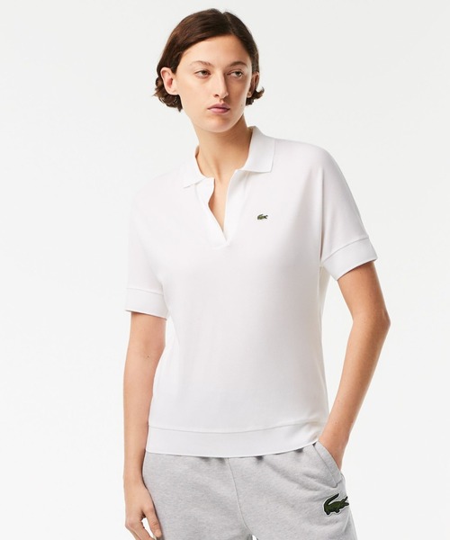 LACOSTE(ラコステ)の「リラックスフィットピケポロシャツ(半袖)(ポロシャツ・レディース・ベビーピンク/ブラック/ホワイト/ネイビー・M/S/XS/L)」の1枚目の写真