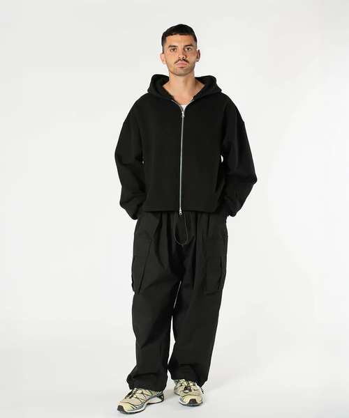 WISM（ウィズム）の「Estudio Niksen / エストゥディオ・ニクセン Boxy Zip-up Hoodie（パーカー・メンズ・ライトグレー/ブラック・1/2）」の9枚目の写真