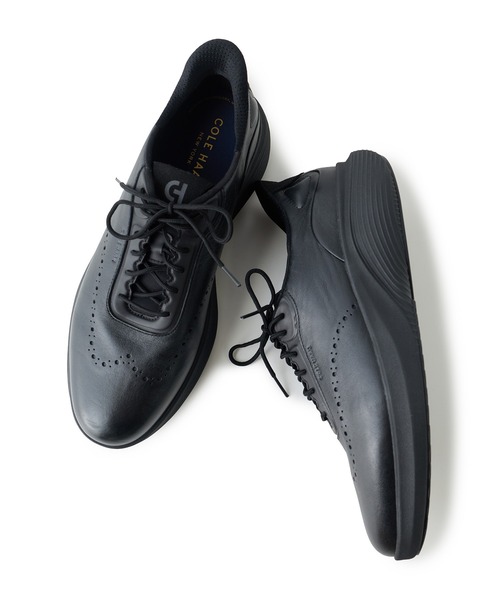 MEN'S BIGI(メンズビギ)の「COLE HAAN Original Grand Neo Arc Quick-On Wingtip Oxfords(スニーカー・メンズ・ブラック・01/02)」の1枚目の写真