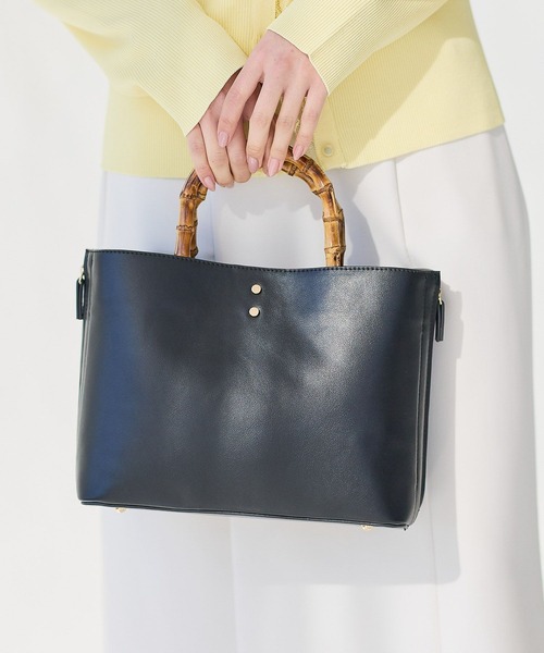 Andemiu（アンデミュウ）の「バンブーハンドルバッグ656264（ハンドバッグ・レディース・ライトイエロー/アイボリー/ブラック・FREE）」の2枚目の写真