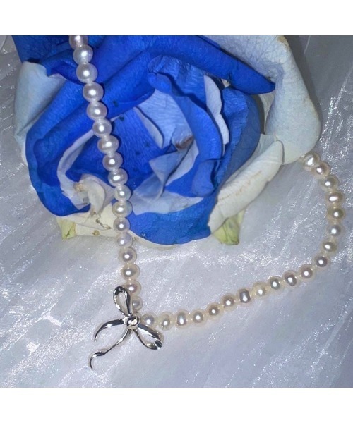NUAVO(ヌアボ)の「Ribbon tie pearls(ネックレス・レディース・シルバー・FREE)」の2枚目の写真