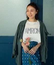 AMERICANA（アメリカーナ）の「【WEB先行予約】[Americana アメリカーナ] 別注 AMRCN ショート丈フロッキープリントTシャツ（Tシャツ/カットソー）」
