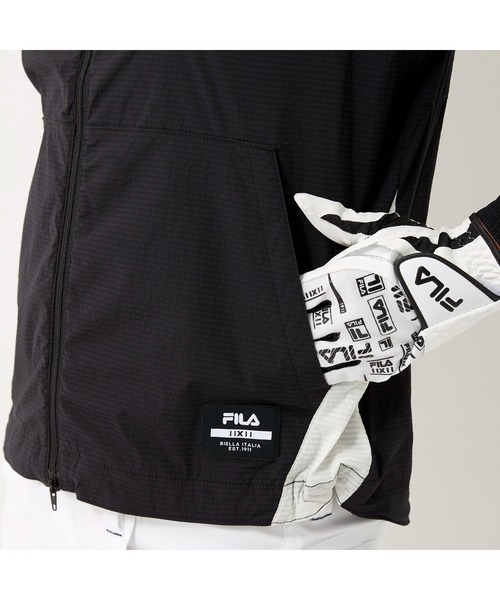 FILA GOLF(フィラゴルフ )の「FILA GOLF/フィラゴルフ ストレッチ ハイネックフード ポケッタブルジャケット/撥水加工 収納袋付き/ゴルフウェア/レディース(その他アウター・レディース・ブルー/ブラック・L/LL/M)」の11枚目の写真