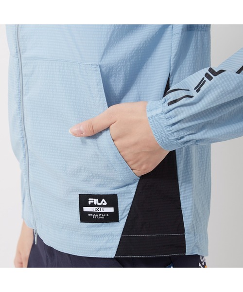 FILA GOLF(フィラゴルフ )の「FILA GOLF/フィラゴルフ ストレッチ ハイネックフード ポケッタブルジャケット/撥水加工 収納袋付き/ゴルフウェア/レディース(その他アウター・レディース・ブルー/ブラック・L/LL/M)」の20枚目の写真