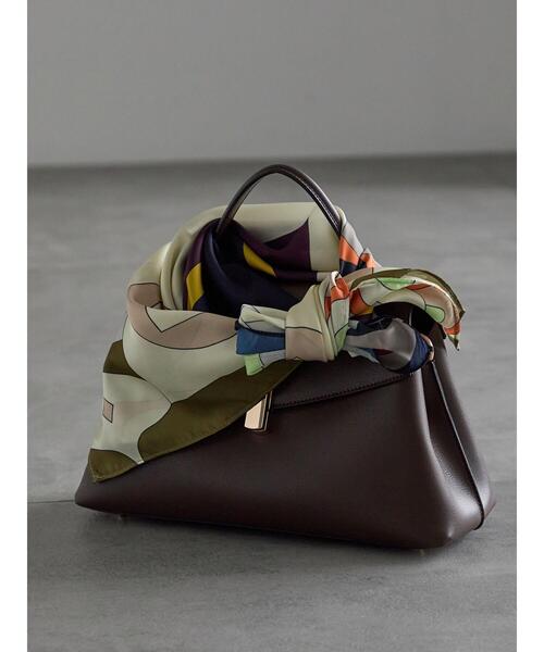 Te chichi（テチチ）の「幾何柄スカーフ（ネックレス・レディース・オレンジ/ホワイト・F）」の2枚目の写真