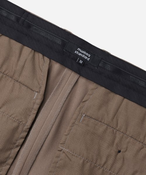 MUSINSA STANDARD（ムシンサスタンダード）の「リラックスしたテーパード隠しバンディングクロップドスラックス[ライトブラウン]（スラックス・メンズ・その他・40/38/42/26/27/28/29/36/34/32/30/31/33）」の7枚目の写真