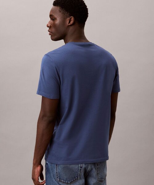 Calvin Klein(カルバン・クライン)の「ショートスリーブ 30s CKグラフィックTシャツ(Tシャツ/カットソー・メンズ・ダークブルー/オフホワイト・L/XL/S/M)」の9枚目の写真