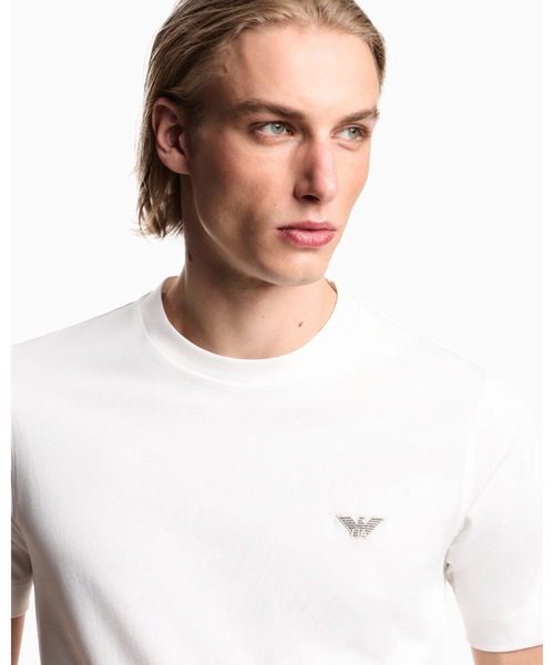 EMPORIO ARMANI(エンポリオアルマーニ)の「【エンポリオ アルマーニ】スリムフィットTシャツ ヘビージャージー(Tシャツ/カットソー・メンズ・オフホワイト/ブルー系/ネイビー・LARGE/MEDIUM/SMALL/X-LARGE/X-SMALL/XX-LARGE)」の1枚目の写真