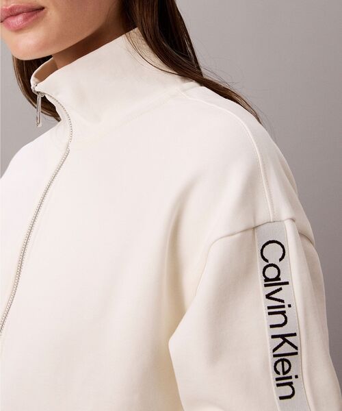 Calvin Klein（カルバン・クライン）の「ロゴテープフルシップジャケット（スウェット・レディース・オフホワイト/ネイビー・XS/M/S）」の3枚目の写真