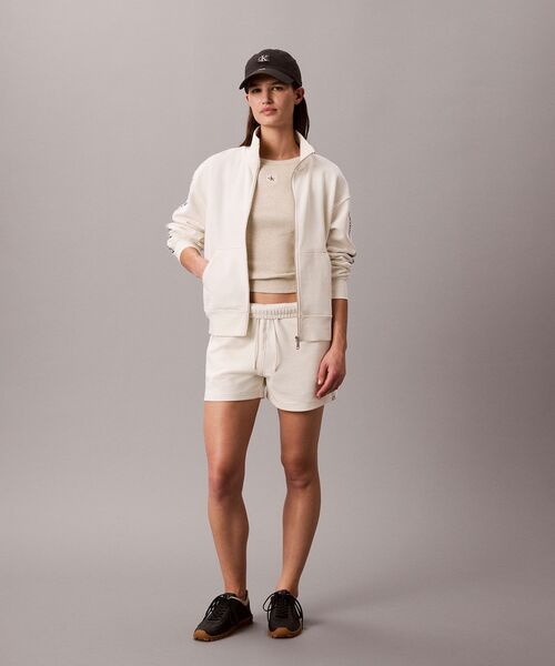 Calvin Klein（カルバン・クライン）の「ロゴテープフルシップジャケット（スウェット・レディース・オフホワイト/ネイビー・XS/M/S）」の6枚目の写真