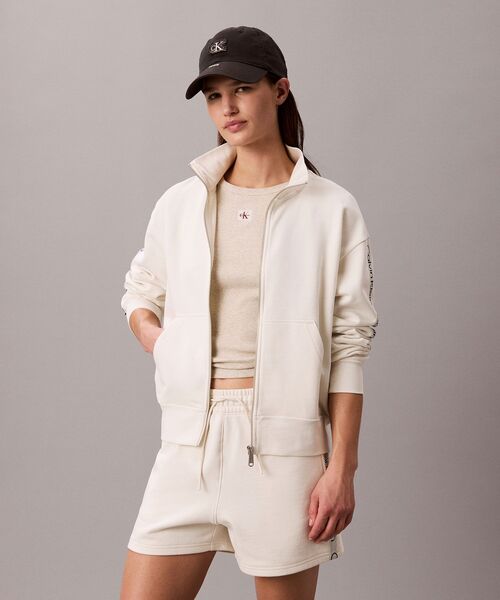 Calvin Klein（カルバン・クライン）の「ロゴテープフルシップジャケット（スウェット・レディース・オフホワイト/ネイビー・XS/M/S）」の17枚目の写真