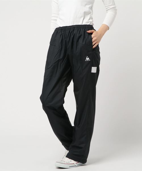 le coq sportif（ルコックスポルティフ）の「ルコックスポルティフ ウィンドパンツ QMWMJG21（その他パンツ・レディース・ブラック/ネイビー・LL/M/L）」の2枚目の写真