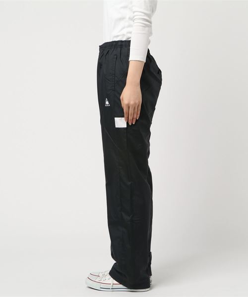 le coq sportif（ルコックスポルティフ）の「ルコックスポルティフ ウィンドパンツ QMWMJG21（その他パンツ・レディース・ブラック/ネイビー・LL/M/L）」の3枚目の写真