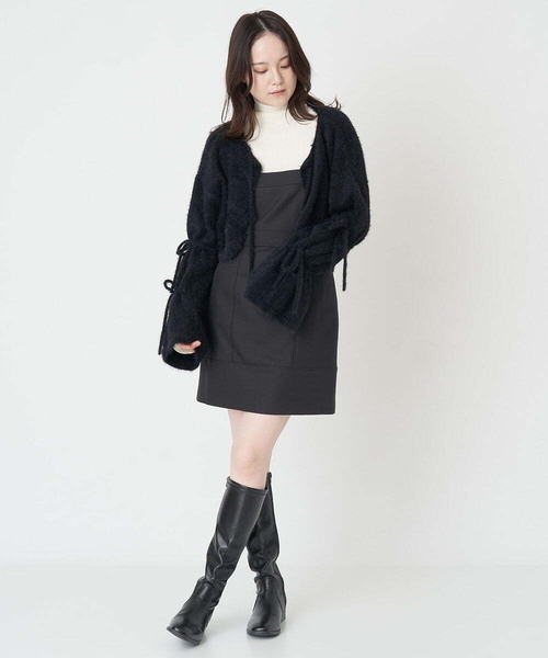 A de a.v.v(アードアー・ヴェ・ヴェ)の「フェザーフレアキャンディスリーブカーディガン(カーディガン/ボレロ・レディース・ブラック/アイボリー・36/38)」の4枚目の写真