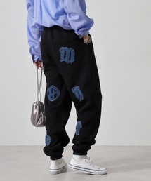RE730（アールイーセブンサーティー）の「Denim applique embroidery jogger pants / デニムアップリケ刺繍ジョガーパンツ unisex（スウェットパンツ）」