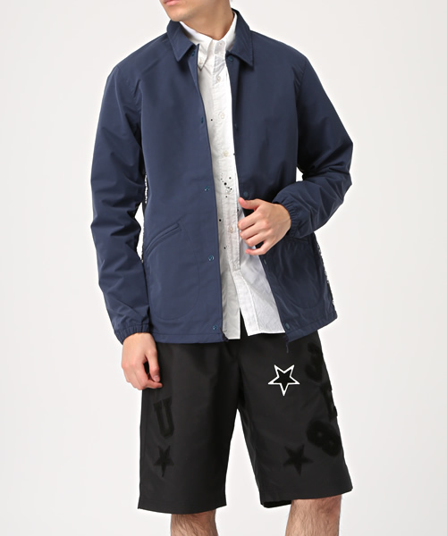 uniform experiment(ユニフォームエクスペリメント)の「NUMBERING STAR TAPE LINE COACH BLOUSON(ブルゾン・メンズ・ブラック/ネイビー・1/2/3)」の2枚目の写真