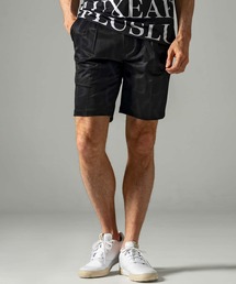 LUXEAKMPLUS（リュクスエイケイエムプラス）の「LUXEAKMPLUS(リュクスエイケイエムプラス)ゴルフ 総柄ロゴハーフスラックス（スラックス）」