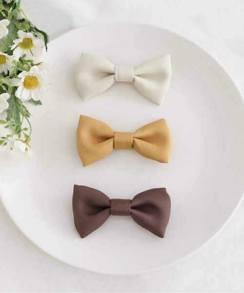 BREEZE（ブリーズ）の「キッズ 蝶ネクタイ(レザー調)（蝶ネクタイ・キッズ・アイボリー/ブラウン/マスタード・FREE）」の4枚目の写真