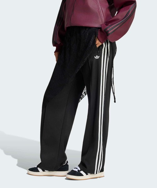 adidas(アディダス)の「レーススカート付き 2イン1 ファイヤーバード ルーズ トラックパンツ / アディダスオリジナルス adidas Originals(スウェットパンツ・レディース・ブラック・XX-LARGE/LARGE/MEDIUM/SMALL/X-LARGE/X-SMALL)」の1枚目の写真