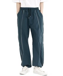 GRAYBLVD（グレイブラバット）の「バスツパイピングトラックパンツ (ブルーグリーン)（スウェットパンツ）」