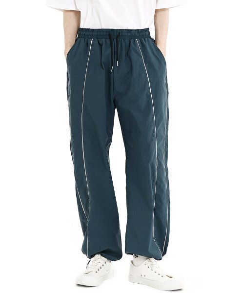GRAYBLVD(グレイブラバット)の「バスツパイピングトラックパンツ (ブルーグリーン)(スウェットパンツ・レディース・その他・MEDIUM/LARGE)」の1枚目の写真