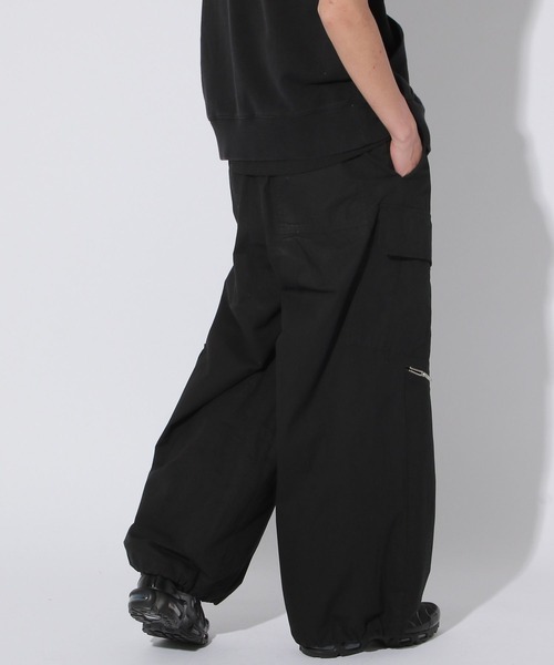 Anui（アニュイ）の「【UNISEX/2サイズ展開】アシメZIPパラシュートパンツ（カーゴパンツ・レディース・グレー/ブラック・MEDIUM/SMALL）」の21枚目の写真