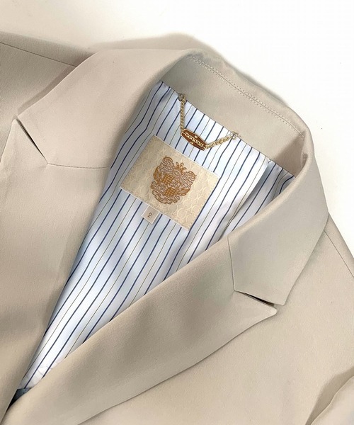 Q（キュー）の「TRストレッチピークドラペルジャケット（テーラードジャケット・レディース・チャコールグレー/グレイッシュベージュ・MEDIUM）」の6枚目の写真