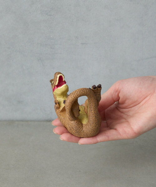 BIRTHDAY BAR（バースデイバー）の「スマホホルダー　ティラノサウルス（スマホグッズ・レディース・オレンジ・0）」の2枚目の写真