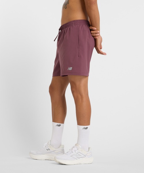 NEW BALANCE（ニューバランス）の「Sport Essentials ショーツ5インチ(インナー付き)（その他パンツ・メンズ・オレンジ/パープル・X-LARGE/LARGE/MEDIUM/SMALL）」の3枚目の写真