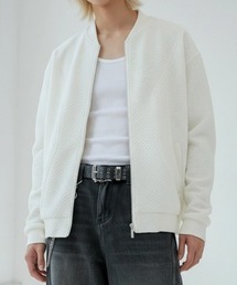 BENUSTA（ベヌスタ）の「A'GEM/9 × .kom 『BENUSTA /ベヌスタ』TEXTURED WHITE ZIP BLOUSON /テクスチャード ホワイトジップブルゾン（MA-1）」