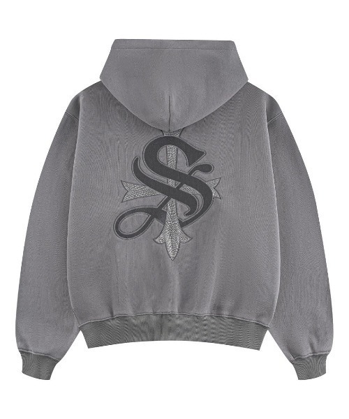 A'GEM/9 × .kom エージェムナインクロスモチーフジップアップパーカー A'gem 9（エージェムナイン）の「A'GEM/9 × .kom 『A'GEM/9/エージェム