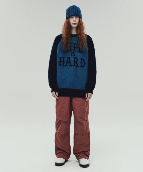 THEVINYLHOUSE(ザバイニルハウス)の「PADDED PARACHUTE PANTS BRICK (VH2DWUPA60A)(スウェットパンツ・メンズ・その他・S/M/L)」の1枚目の写真