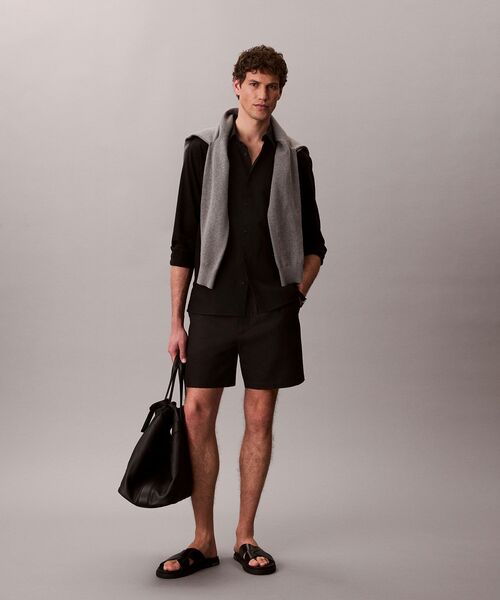Calvin Klein(カルバン・クライン)の「シャツ - ロングスリーブソリッドクラシックシャツ(シャツ/ブラウス・メンズ・ホワイト/ブラック・M/L/XL/S)」の6枚目の写真