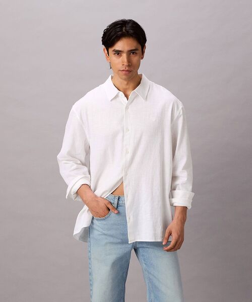 Calvin Klein(カルバン・クライン)の「シャツ - ロングスリーブソリッドクラシックシャツ(シャツ/ブラウス・メンズ・ホワイト/ブラック・M/L/XL/S)」の11枚目の写真