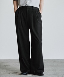 WYM LIDNM（ウィム バイ リドム）の「ARC CURVED AMUNDSEN SLACKS（スラックス）」