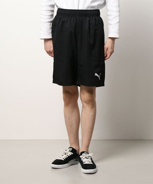 PUMA(プーマ)の「PUMA プーマ メンズ ACTIVE ウーブンショーツ 9インチ(その他パンツ・メンズ・ブラック/ネイビー・MEDIUM/X-LARGE/SMALL/XX-LARGE/LARGE)」の1枚目の写真